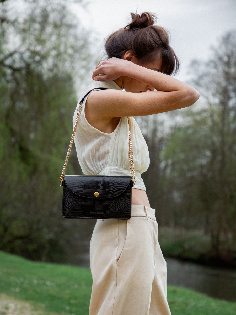 Sac pochette cuir noir sale