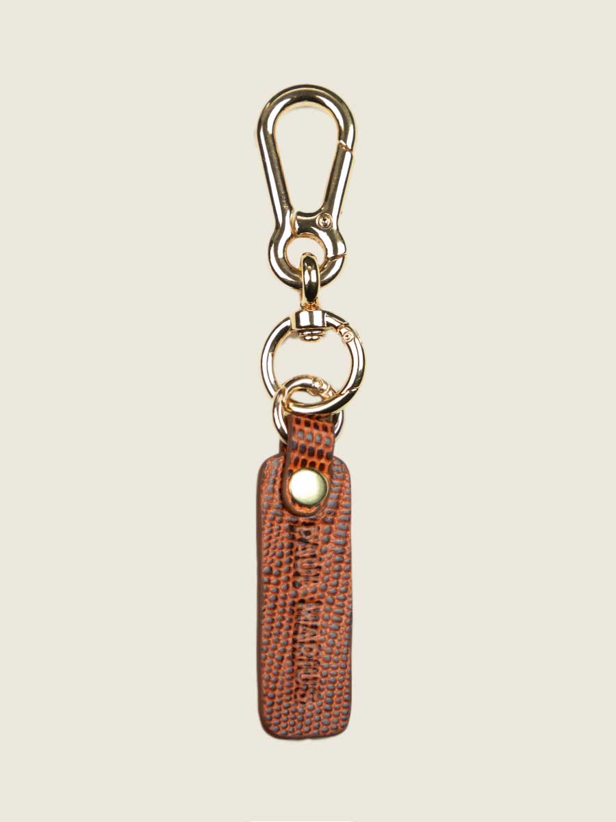 photo-vue-de-face-porte-cles-cuir-marron-leporte-cles-breloque-1960-ambre-paul-marius-lkc-logo-l-l