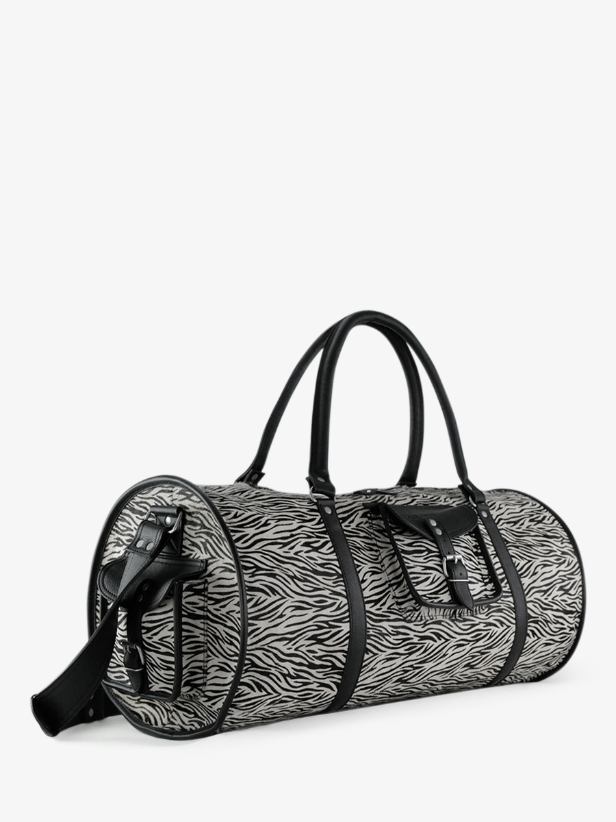 photo-vue-de-cote-sac-de-voyage-cuir-femme-levoyageur-xl-zebre-paul-marius-