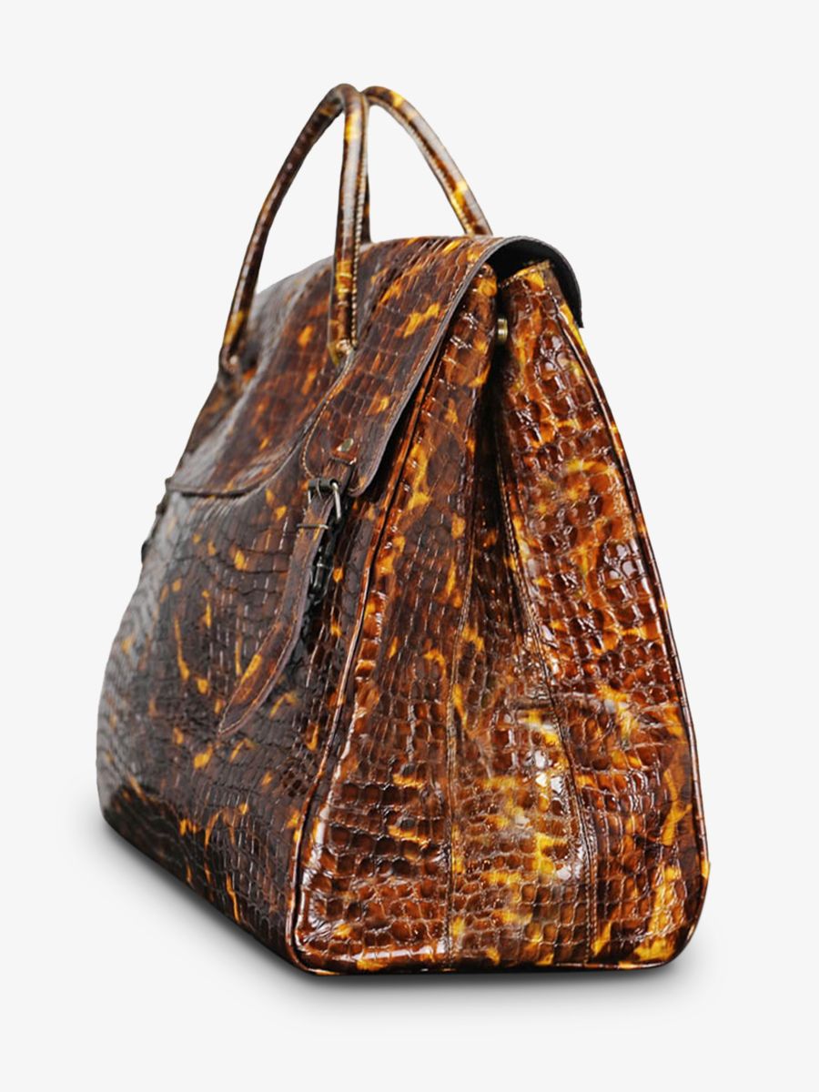 photo-vue-de-cote-grand-sac-de-voyage-cuir-homme-argente-rouen-delhi-caiman-ambre-verni-paul-marius-m105-c-am
