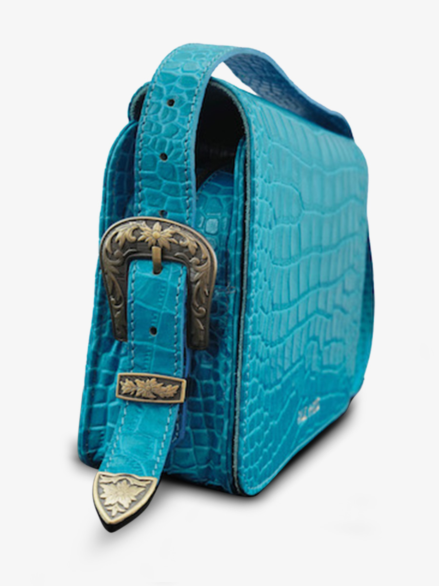 photo-vue-de-cote-sac-bandouliere-cuir-femme-bleu-lebaguette-alligator-cocktail-topaze-paul-marius-w29-a-blu